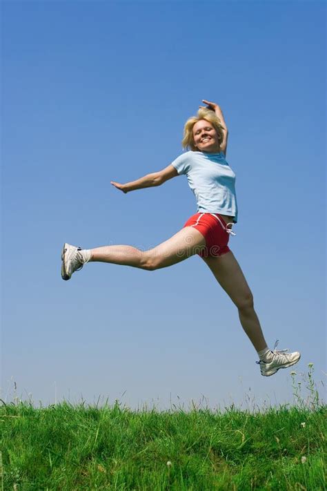 Happy young woman jumping stock photo. Image of funny - 2777426 