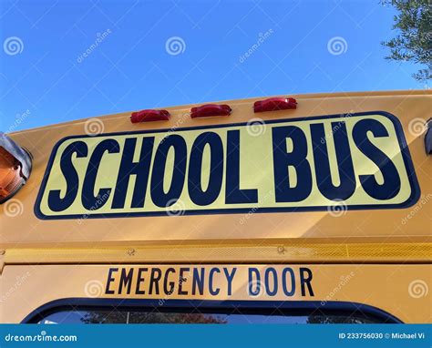 School Bus Sign Above Rear Emergency Exit Door. Close Up Stock Photo ...