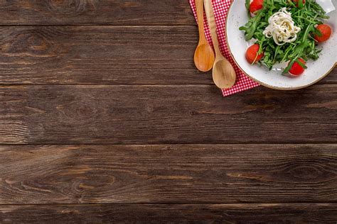 HD wallpaper: salad on white ceramic plate on brown wooden table, background | Wallpaper Flare