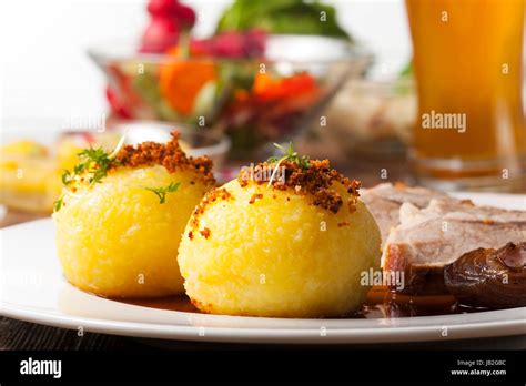 Kartoffelkn Del Und Bayerischer Schweinebraten Stock Photo Alamy