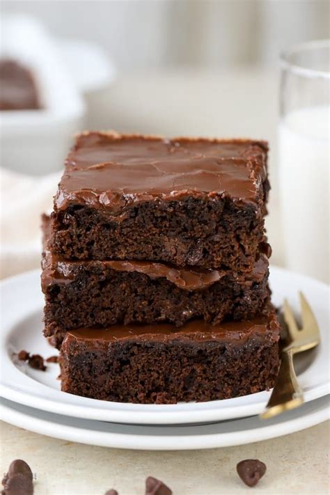 Rich And Moist Zucchini Brownies Topped With A Fudgy Chocolate Frosting