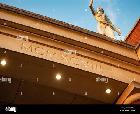 Latin Writing Roman Numerals On The Side Of Building Stock Photo Alamy