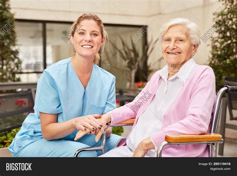 Caring Geriatric Nurse Image And Photo Free Trial Bigstock