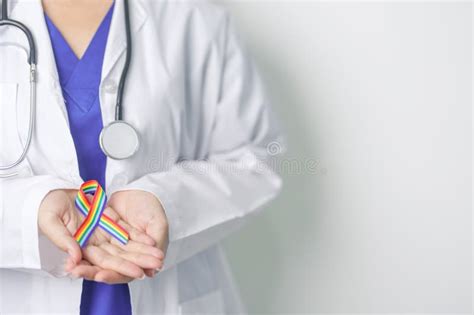 Doctor With LGBTQ Rainbow Ribbon For Support Lesbian Gay Bisexual