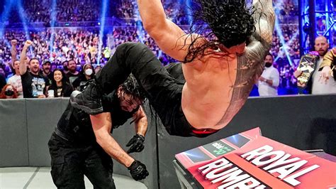 Seth “freakin” Rollins Sends Roman Reigns Through The Announce Table Shield Style Royal Rumble