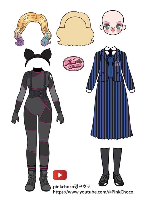 The Paper Doll Is Wearing A Blue And Black Striped Dress With Her Hair