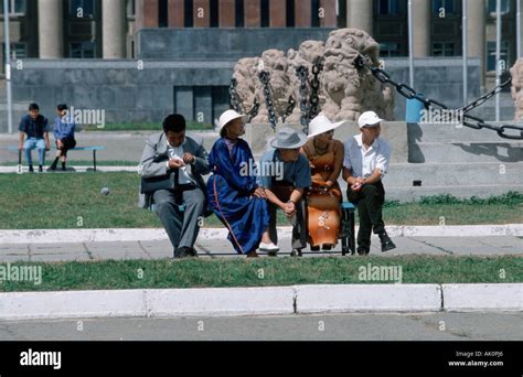 People sitting on bench Stock Photo - Alamy