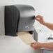 Lavex Janitorial Translucent Black Lever Activated Paper Towel Dispenser