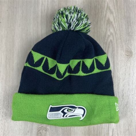 Seattle Seahawks New Era NFL Embroidered Knit Unisex Pom Pom Beanie Cap