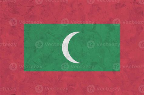 Maldives Flag Depicted In Bright Paint Colors On Old Relief Plastering