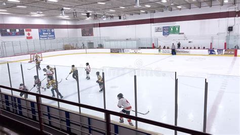 Youth Hockey Teams Competing on the Ice in an Indoor Arena Editorial ...