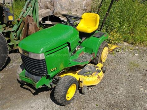 John Deere 325 Tractor With 48 Deck And Plow Allsurplus