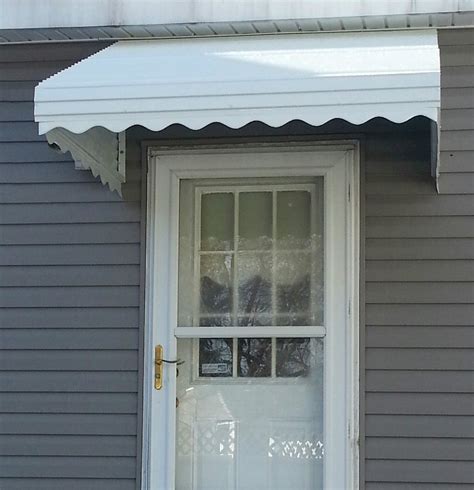 Add new look to your exterior by using door awnings – TopsDecor.com