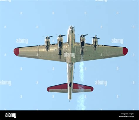 Heavy World War II era Flying Fortress bomber flying overhead Stock ...