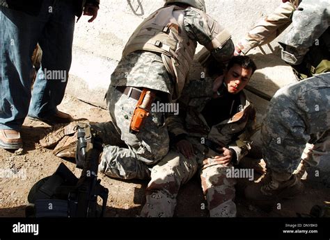 Jan 22 2006 Abu Ghraib Iraq An American Soldier Treats An Iraqi