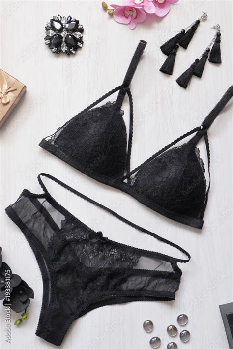 Sexy Lace Lingerie Set On The White Background Fasion Black Thongs And Bra With Women