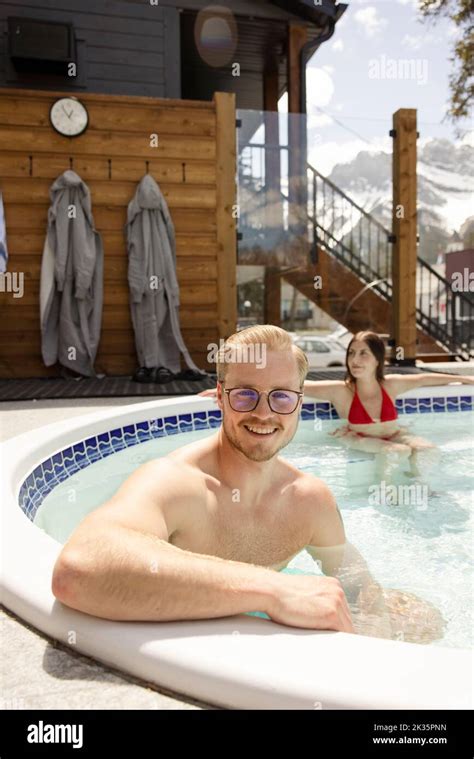 Portrait Of Man In Hot Tub With Wife Stock Photo Alamy
