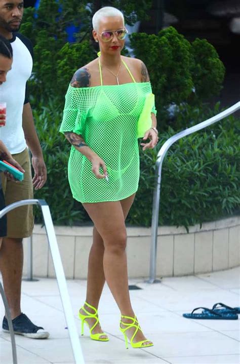 Amber Rose Parades Bum And Boobs In TINY Thong Bikini As She Parties In