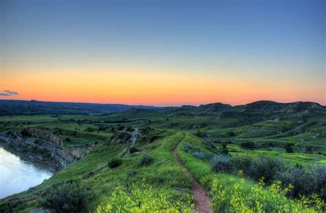 Dusk over hills and grassland at Theodore Roosevelt National Park ...