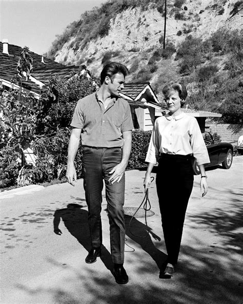 Maggie Johnson Walking With Clint Eastwood On Road Photograph By Globe