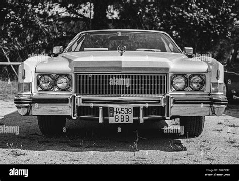 White retro Cadillac Deville classic car parked on a street Stock Photo - Alamy