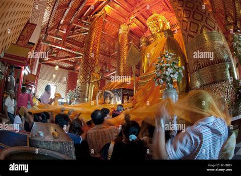 Thai People During A Ceremony In Wat Phanan Choeng A Buddhist Temple