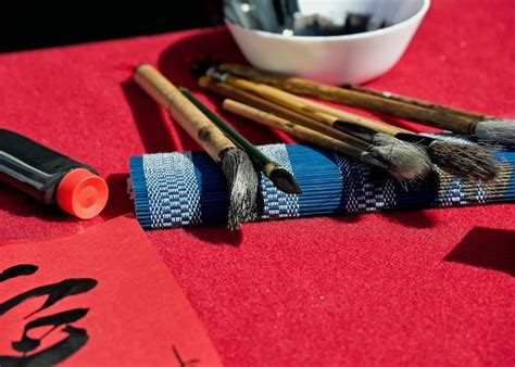 Premium Photo High Angle View Of Paintbrushes On Table