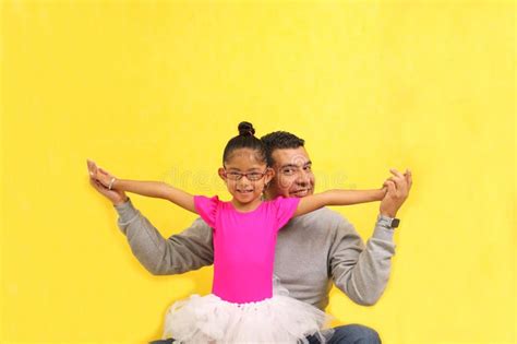 Dad Plays With His Year Old Brunette Latina Daughter Dressed As A Ballerina In A Tutu