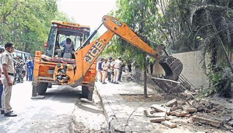 Bulldozers Reach New Friends Colony