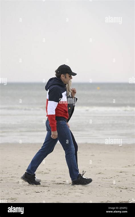 French President Emmanuel Macron and wife Brigitte Macron walking on ...