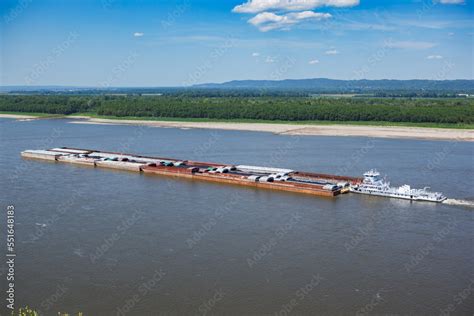 Coal barge floating down the Mississippi River from the scenic overlook ...