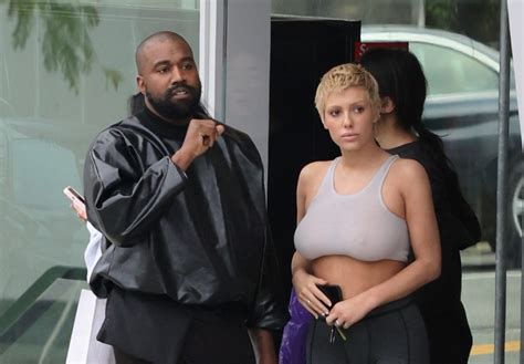 Kanye West Dresses Bianca Censori Naked Under Clear Poncho