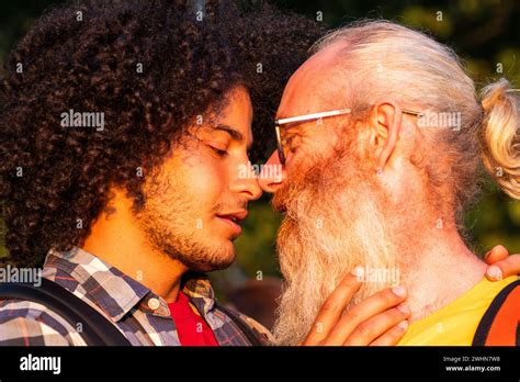 Love Knows No Bounds Joyful Gay Couple Embracing In Nature Stock Photo Alamy