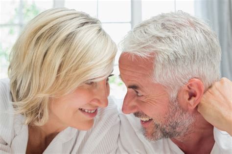 Premium Photo Close Up Of A Happy Mature Couple In Bed
