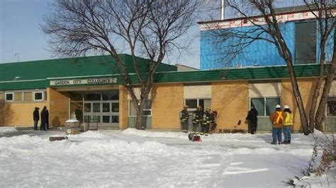 Crews extinguish fire at Garden City Collegiate | CBC News