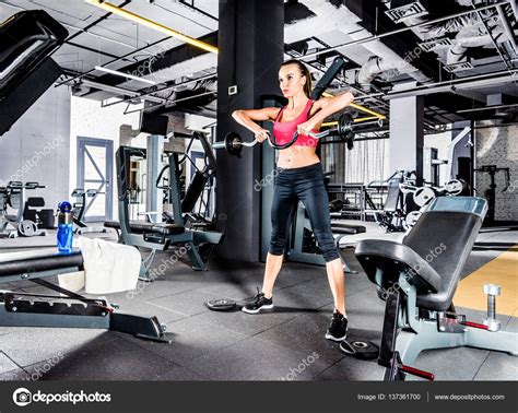 Woman Exercising In Gym — Stock Photo © Dimagavrish 137361700