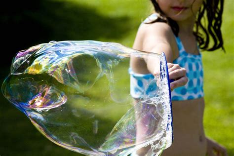 Blowing Giant Bubbles for a Fun Family Activity - Ziggity Zoom Family