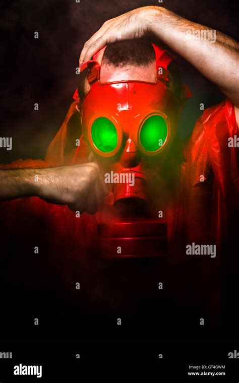 Toxic Horror Concept Man With Red Gas Mask Stock Photo Alamy