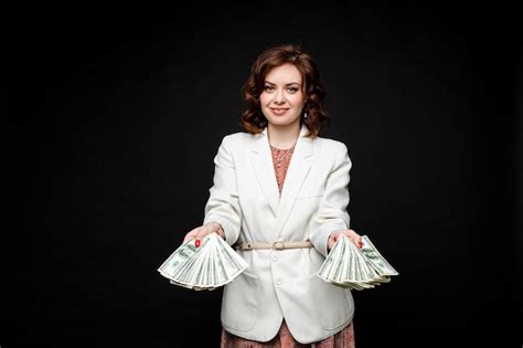Free Photo Successful Stylish Brunette Model With Money In Hands