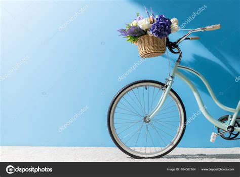 Front Wheel Bicycle Flowers Basket Front Blue Wall Stock Photo by ©AntonMatyukha 184087164