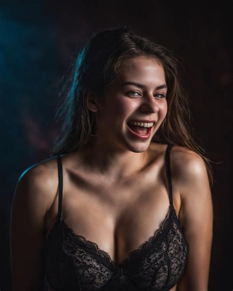 Premium Photo A Woman In A Black Bra Top Laughing