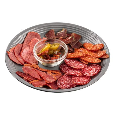 Premium Photo | Isolated plate of sliced meat appetizer platter