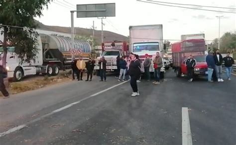 Tlajomulco Reabren carretera Guadalajara Morelia tras caída de árbol