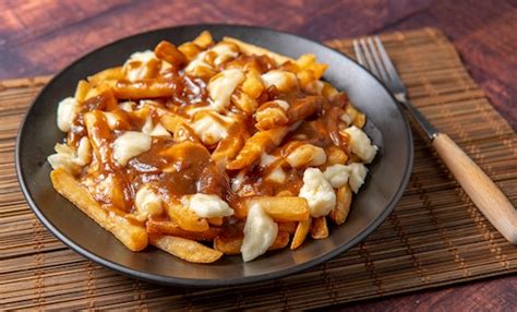 Quick And Easy Poutine Authentic Recipe | TasteAtlas