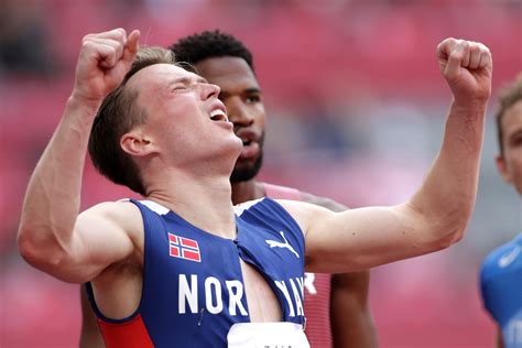 Athletics-Warholm destroys world record to win 400m hurdles gold | Reuters