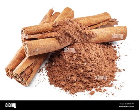 Cinnamon Spice Dried Bark Strips And Ground Cinnamon Isolated On White