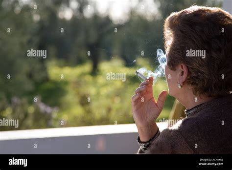 Mature Woman Smoking Hi Res Stock Photography And Images Alamy