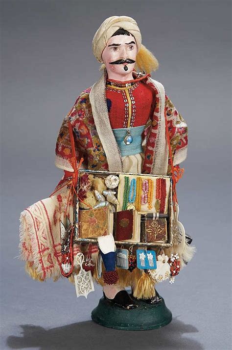 mid  century paper mache peddler man  fancy goods