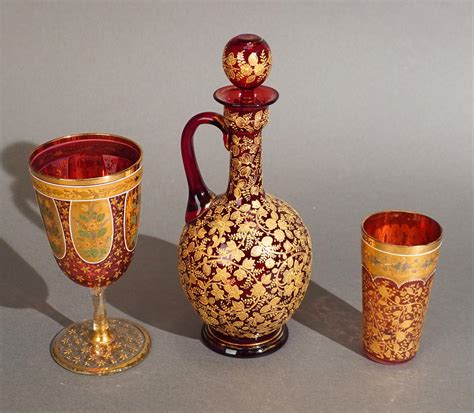 Lot Bohemian Gilt Decorated Red Glass Decanter Goblet And Tumbler Possibly Moser