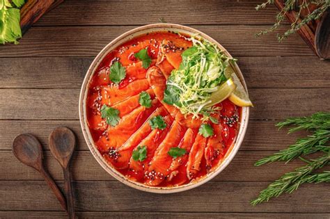 Premium Photo | Plate of gourmet salmon carpaccio salad